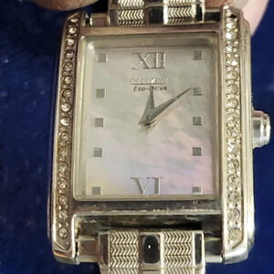 Vintage Y2K Citizen Eco-Drive Ladies Tank Watch with simulated diamond bezel